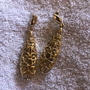 Gold-colored long earrings, approximately 2 inches long
